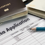 Visa application form to travel Immigration a document Money for Passport Map and travel plan